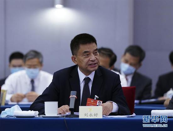  5月23日，全國政協(xié)委員劉永好在政協(xié)聯(lián)組會(huì)上發(fā)言。新華社記者 謝環(huán)馳 攝