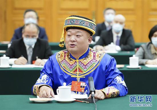  5月24日，全國人大代表宋慶禮參加湖北代表團(tuán)的審議并發(fā)言。新華社記者 黃敬文 攝